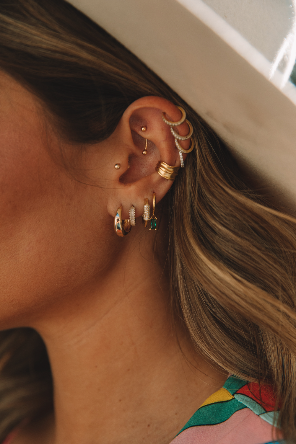 The Emerald Baguette Drop Huggie